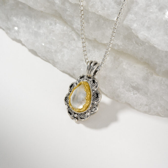 Penelope small Teardrop Pendant is Sterling Silver with Gold plated parts and Doublet Gemstone