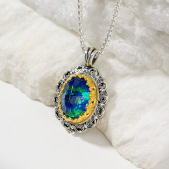 Penelope Big Oval Pendant is Sterling Silver with Gold plated parts and Doublet Gemstone