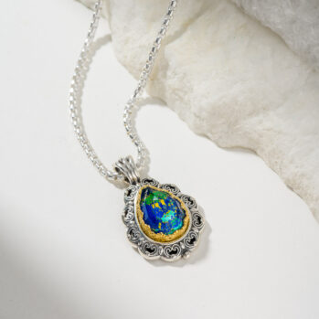 Penelope Medium Teardrop Pendant is Sterling Silver with Gold plated parts and Doublet Gemstone