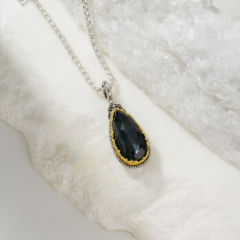 Dione teardrop pendant in sterling silver with Gold plated parts