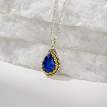 Dione teardrop pendant in sterling silver with Gold plated parts