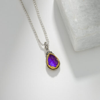 Dione teardrop pendant in sterling silver with Gold plated parts