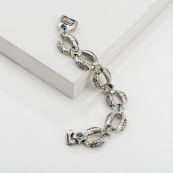 Garden Shadows big link Bracelet in 18K Gold and Sterling silver with Blue topaz