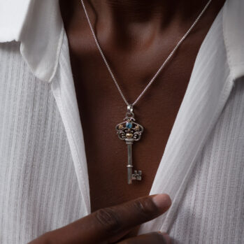 Key pendant in 18K Gold and Sterling Silver with Blue Topaz